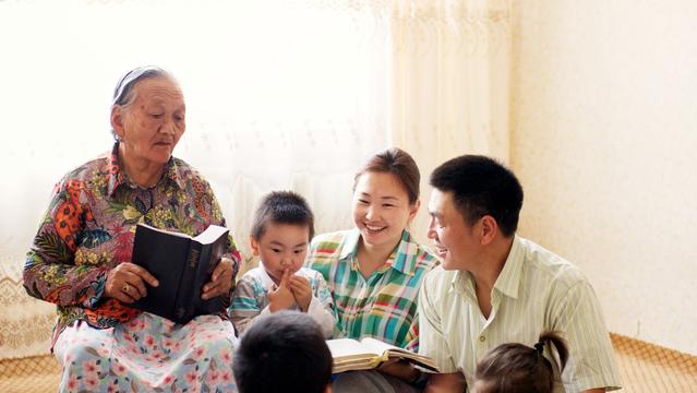 mongolian-family-studying-scriptures-1154446-wallpaper.jpg